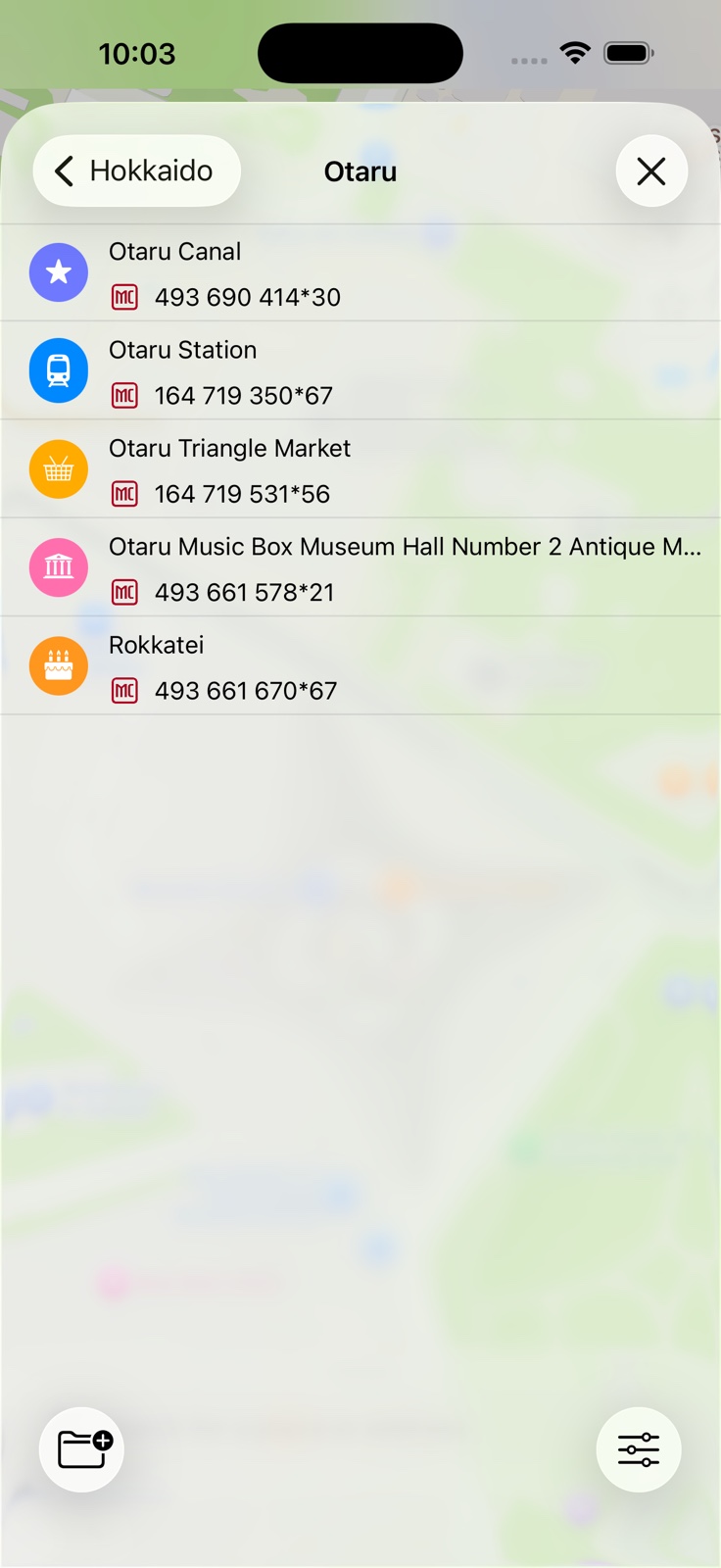 Mappu favorites panel showing saved places with MapCode